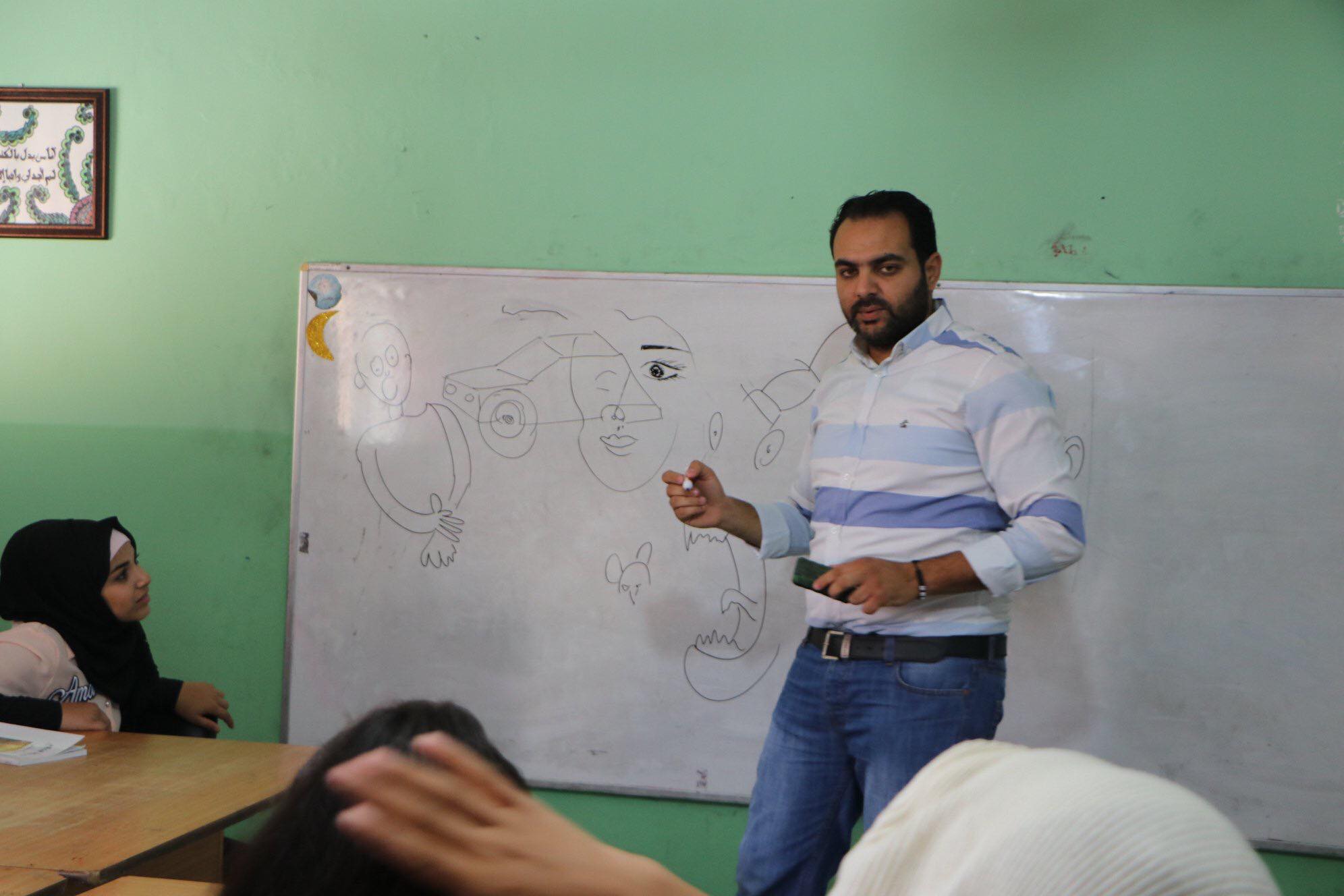 Osama Nazzal, cartoonist, at a workshop