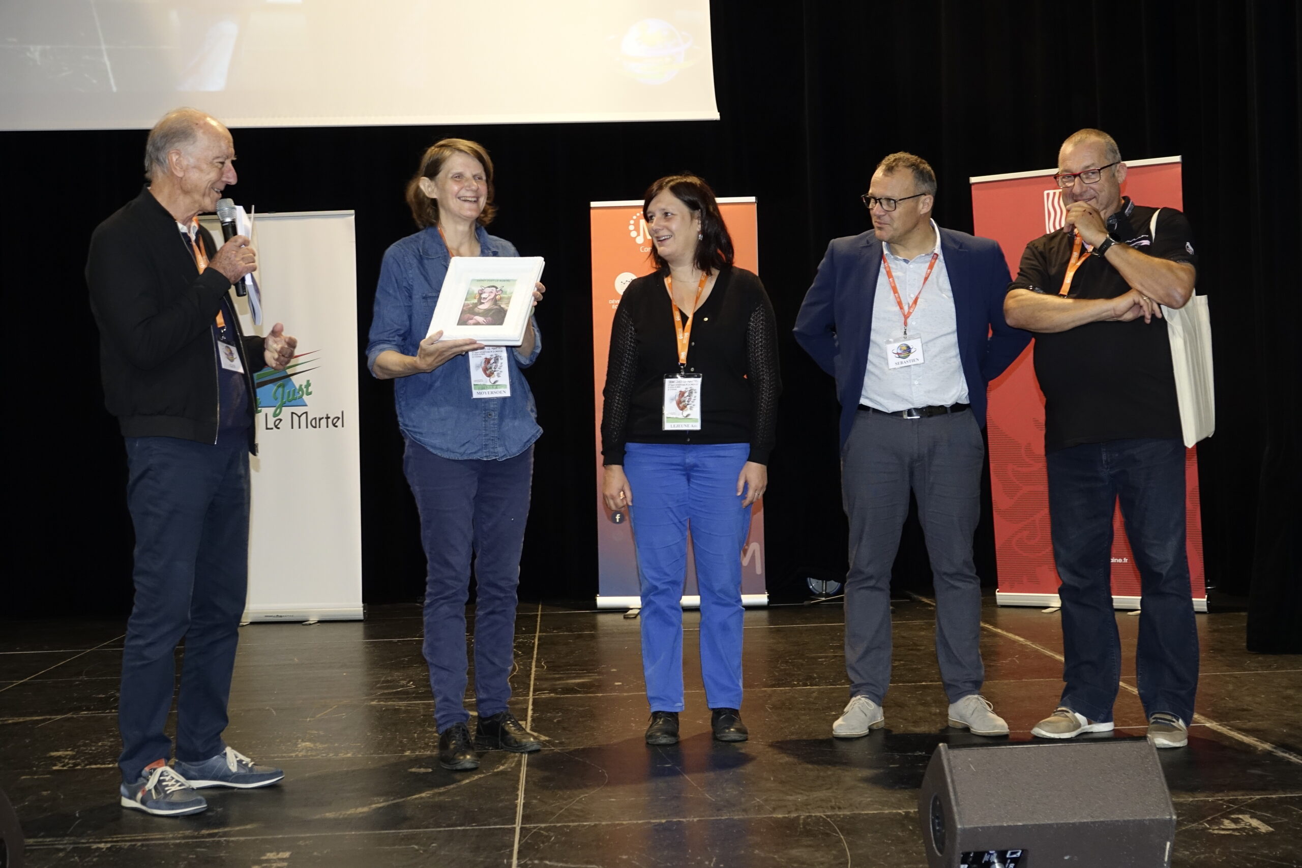 The Cartooning for Peace team receiving the « Crayon de Porcelaine » prize