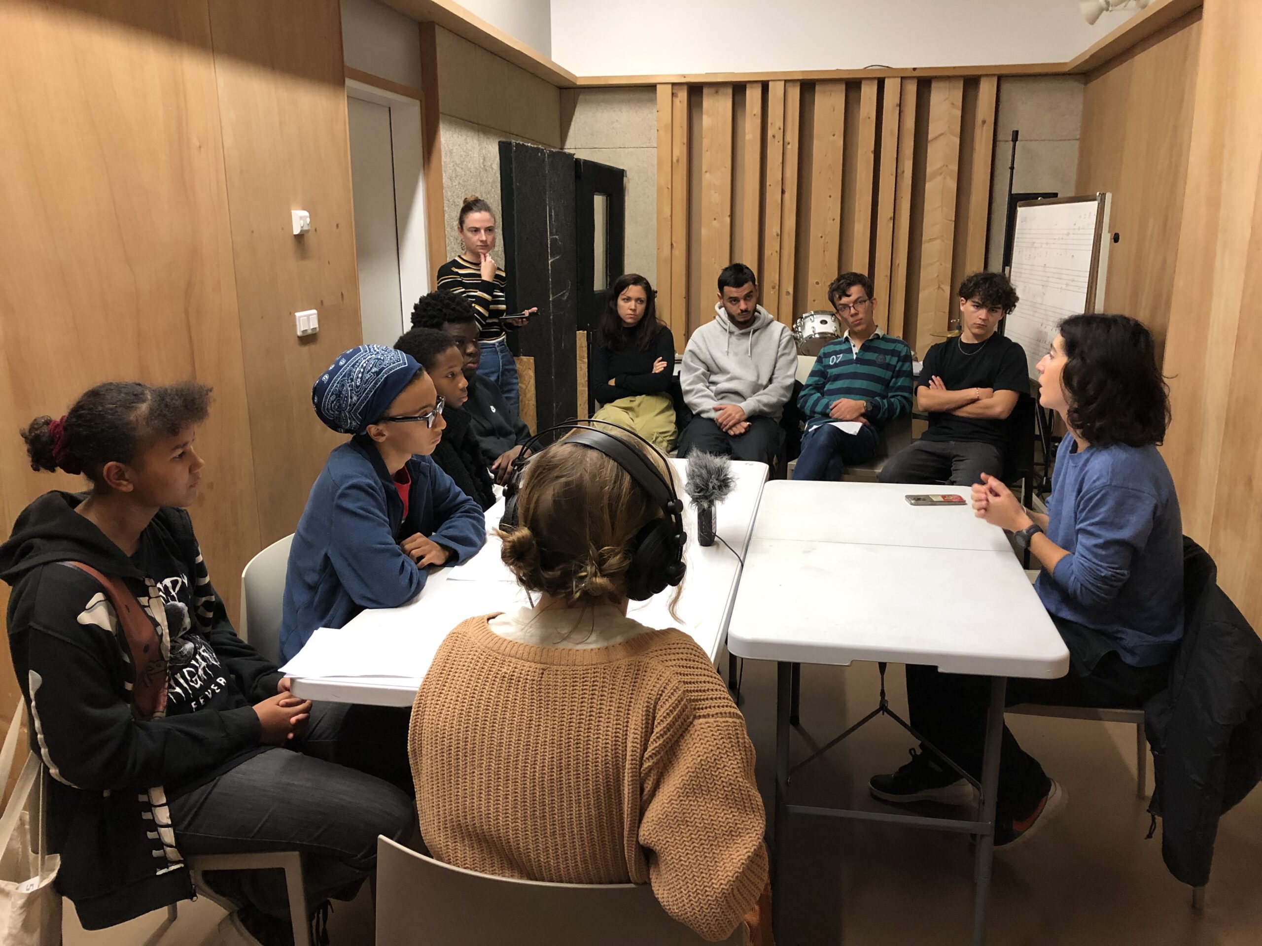 The young people interviewing Charlotte Hym, skateboarder